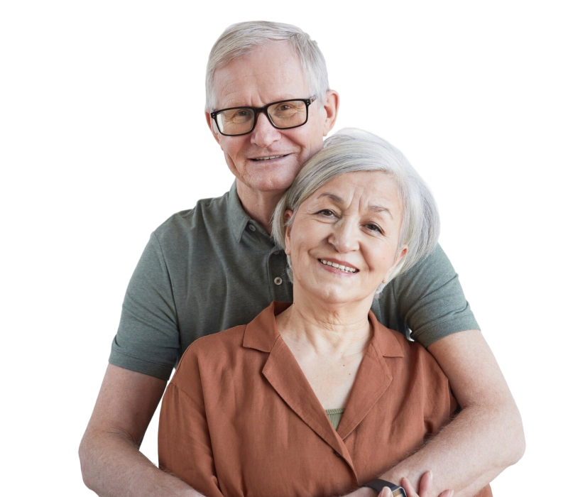 vertical-portrait-loving-senior-couple-embracing-looking-camera-while-standing-against-white-background